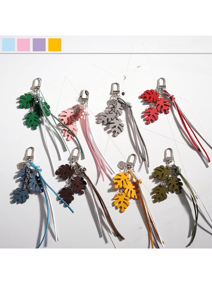 Close-up of Keypus creative leaf shaped keychain in green color