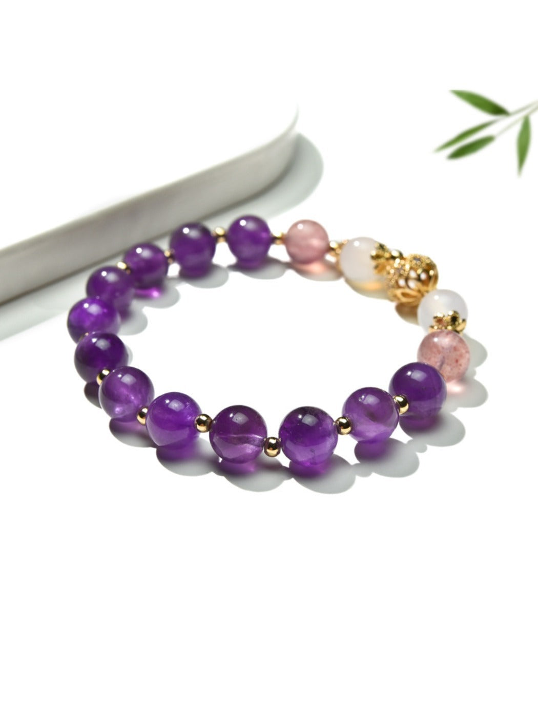 Lovra vintage purple beaded bracelet worn on wrist with natural lighting