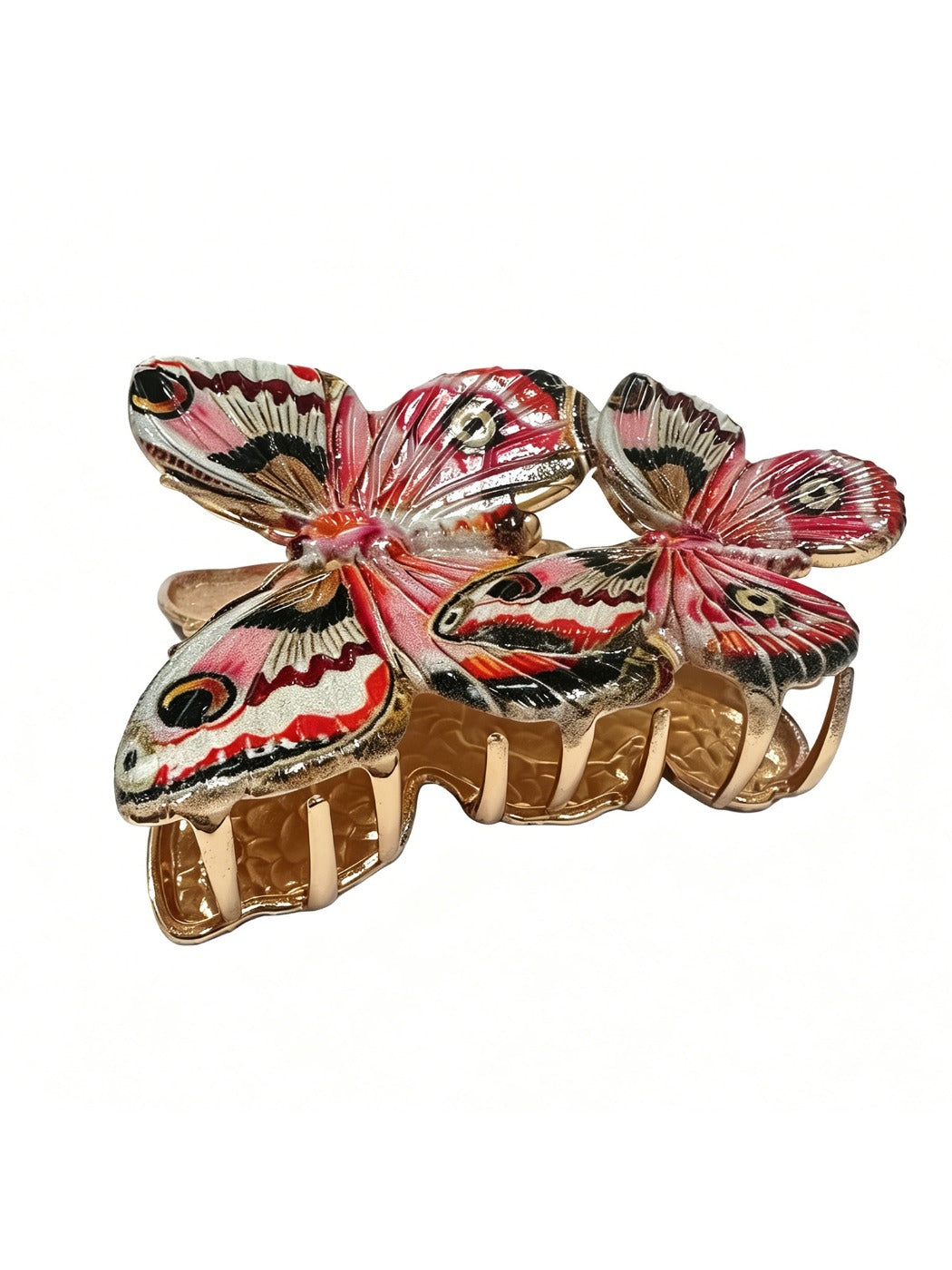 Red butterfly hair clip attached to brown hair showing size and shape