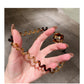 Gifty - Retro Spiral Cord Smiley Face Hair Tie