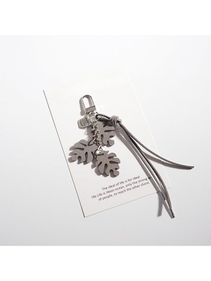 Side angle of Keypus creative leaf shaped keychain with metal ring