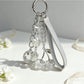 Keypus cherry charm keychain held in hand showing size and detail