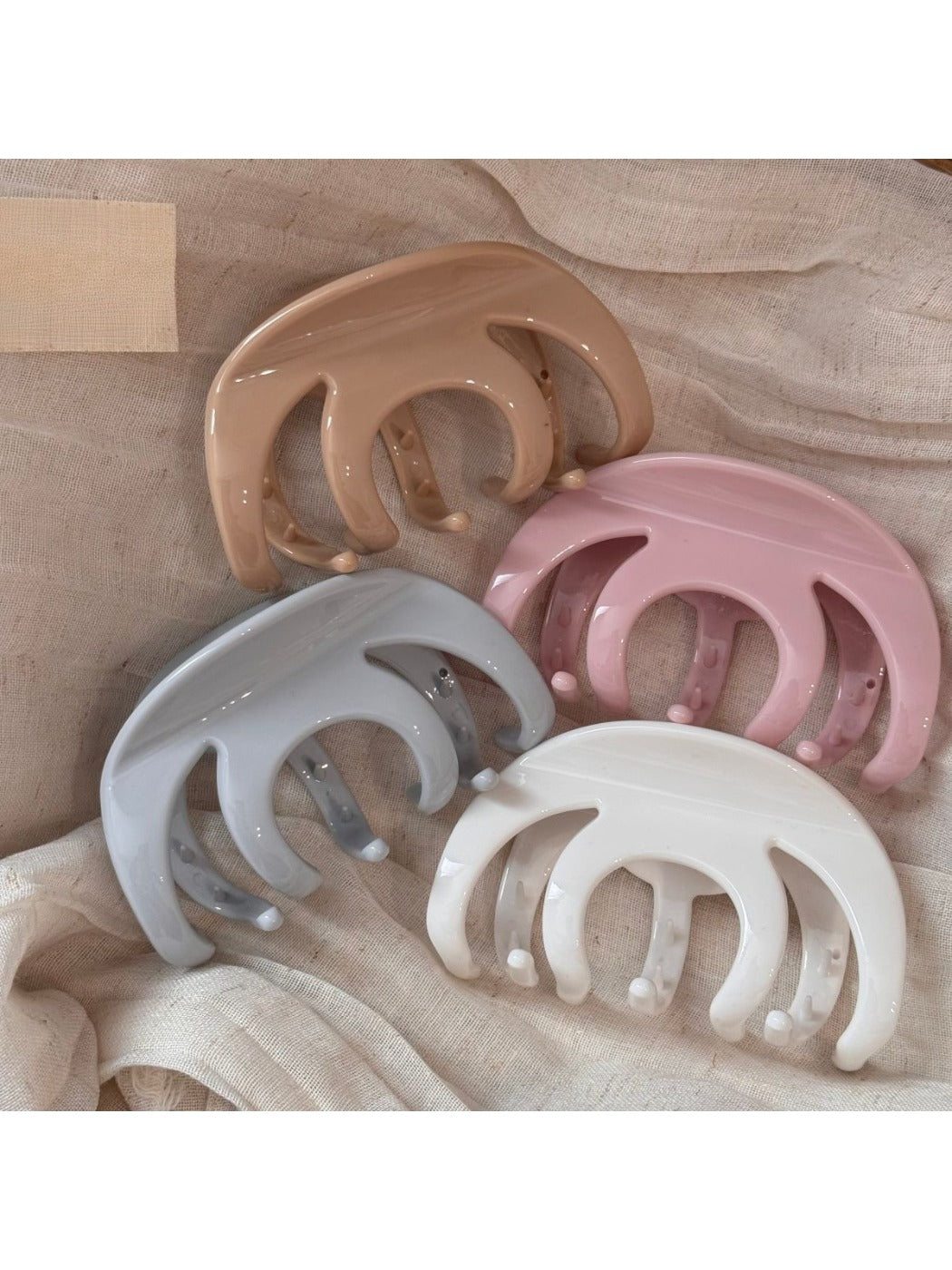 Beau hair clip open, displaying the clip mechanism and smooth finish