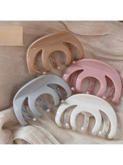 Beau hair clip open, displaying the clip mechanism and smooth finish