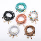 Lovra Ocean Themed Pendant Stackable Beaded Bracelet with blue and white beads