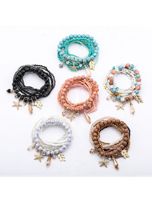 Lovra Ocean Themed Pendant Stackable Beaded Bracelet with blue and white beads