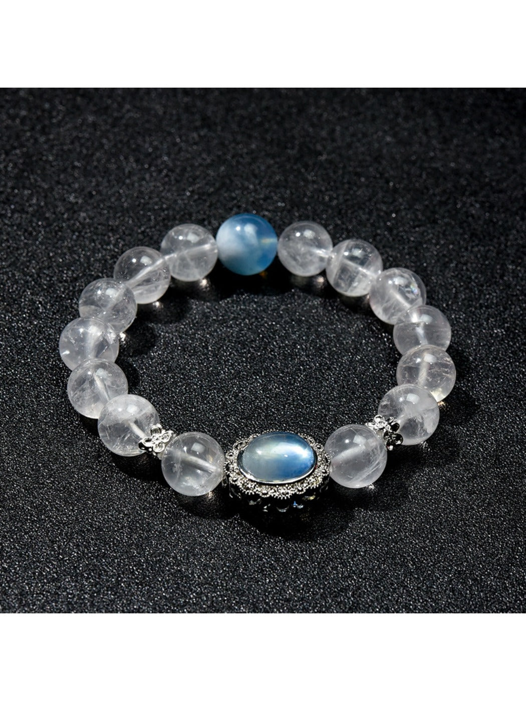 Lovra white crystal beaded bracelet with round clear beads on a white background