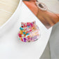 Beau cat hair claw clip styled in long hair from side profile