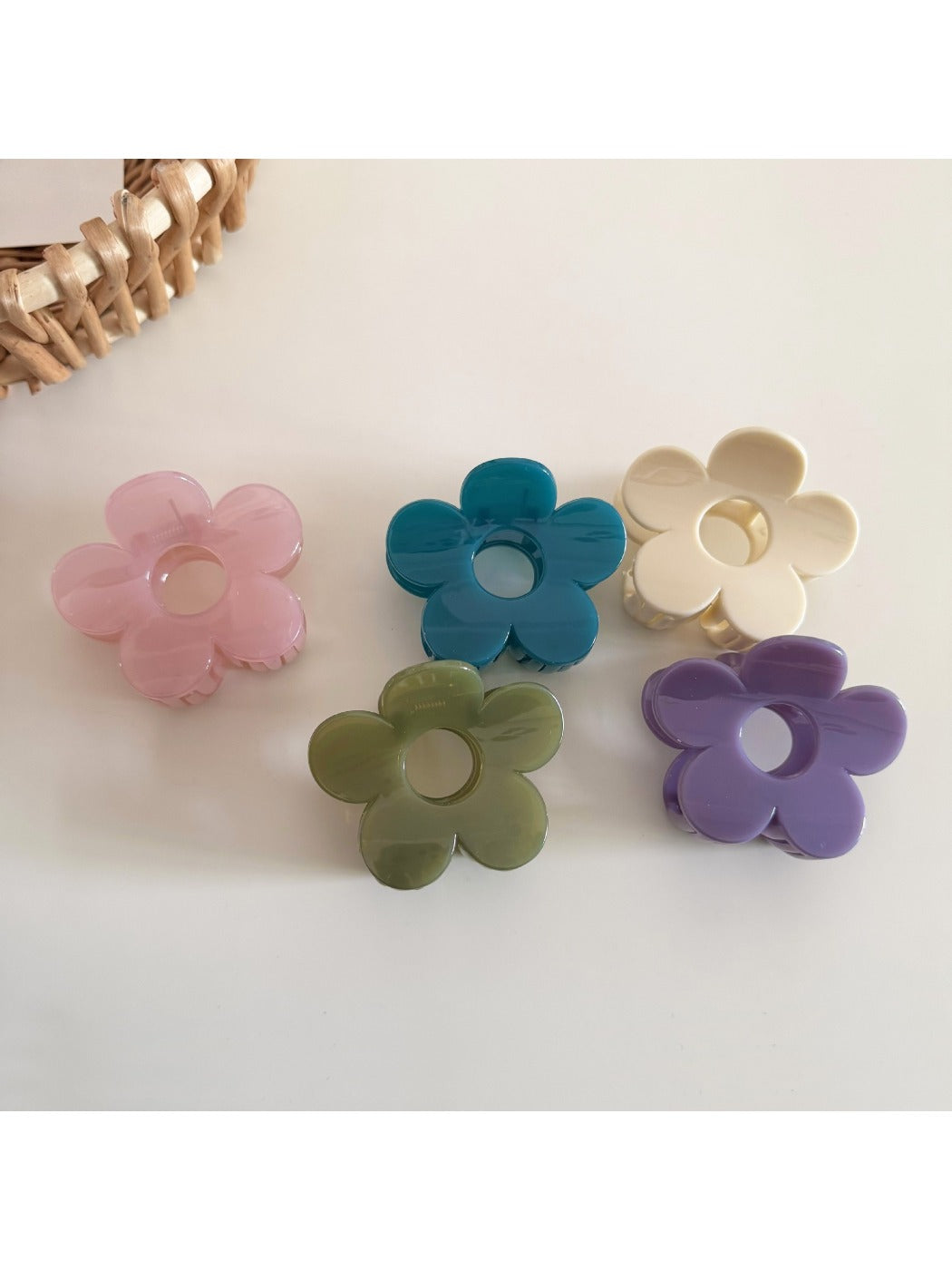 Close-up of Beau flower hair clip showing textured petals and center detail