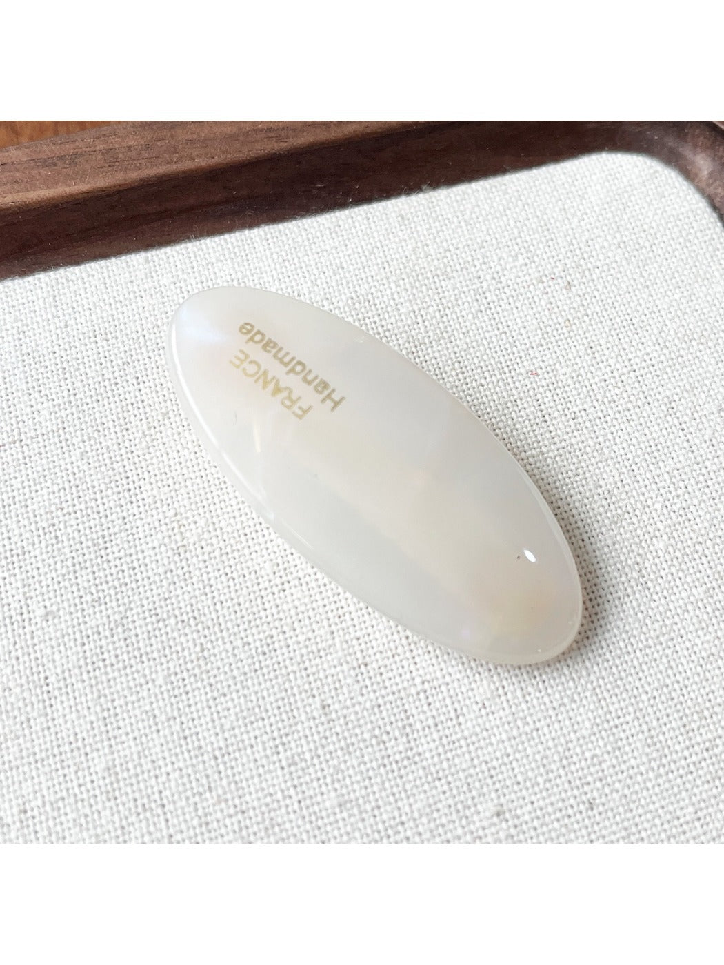 Beau Sweet Oval Acetate Hair Clip shown from above emphasizing oval shape