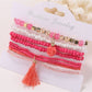 Lovra flower shaped pendant beaded bracelet in natural light emphasizing color and design