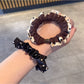 Gifty - Ruffled Polka Dot Scrunchie