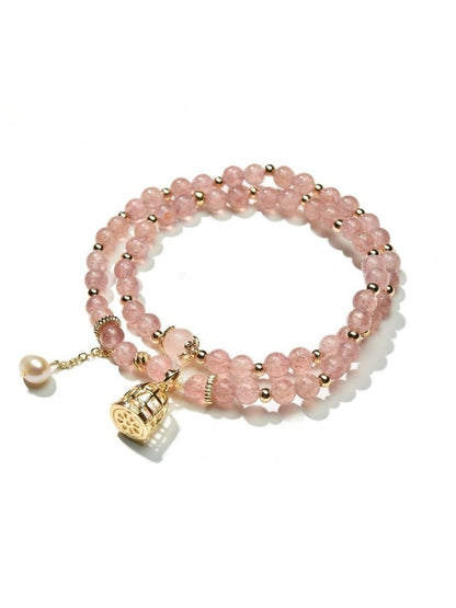 Lovra bracelet with pink crystals and colorblock beads arranged in a stylish pattern