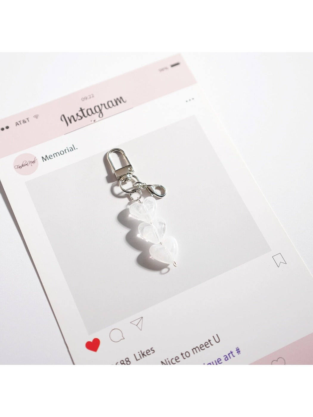Keypus bag charm keychain held in hand to show size and scale