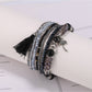 Lovra boho bracelet displayed flat showing all rows of beads and tassels