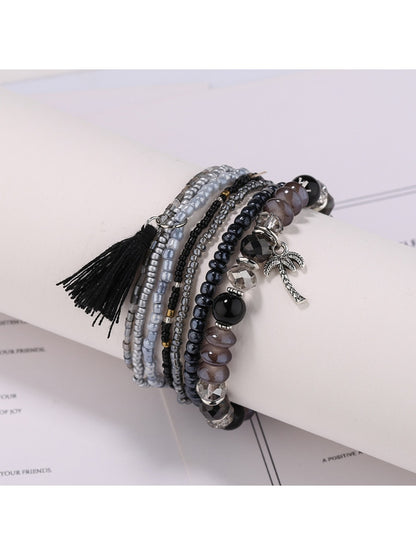Lovra boho bracelet displayed flat showing all rows of beads and tassels