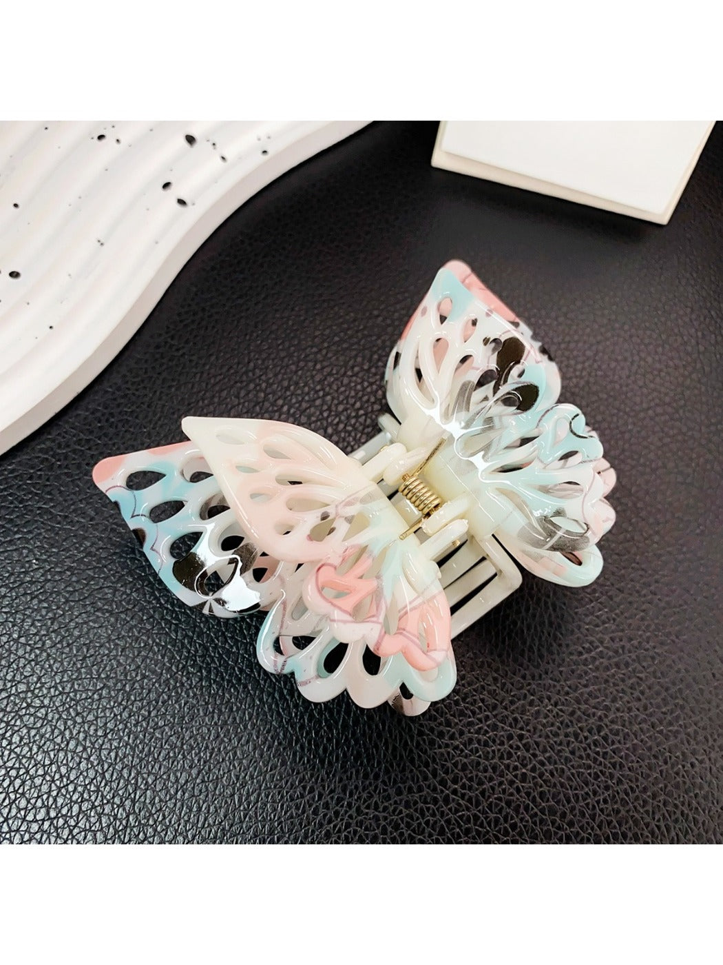 Beau double layer hollow bow shaped claw clip in beige with light shadow
