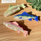 Side view of Beau elegant salmon shaped hair claw clip with curved teeth