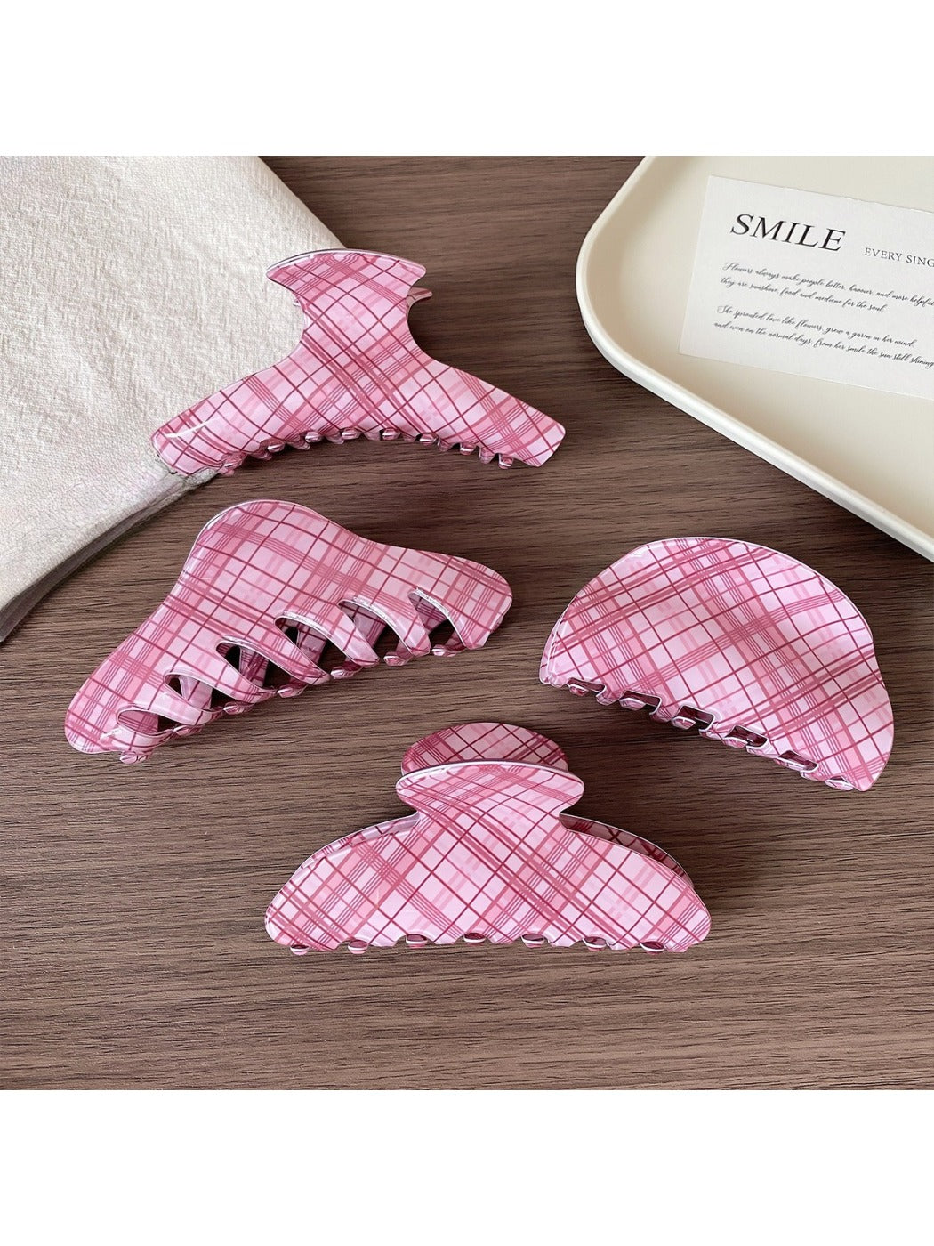 Side view of Beau pink plaid hair claw clip highlighting clasp mechanism