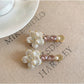 Beau Sweet Style flower hair clip with pink and white petals on a white background