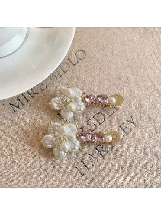 Beau Sweet Style flower hair clip with pink and white petals on a white background