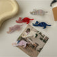 Close-up of Beau cat shaped hair clip showing detailed face design