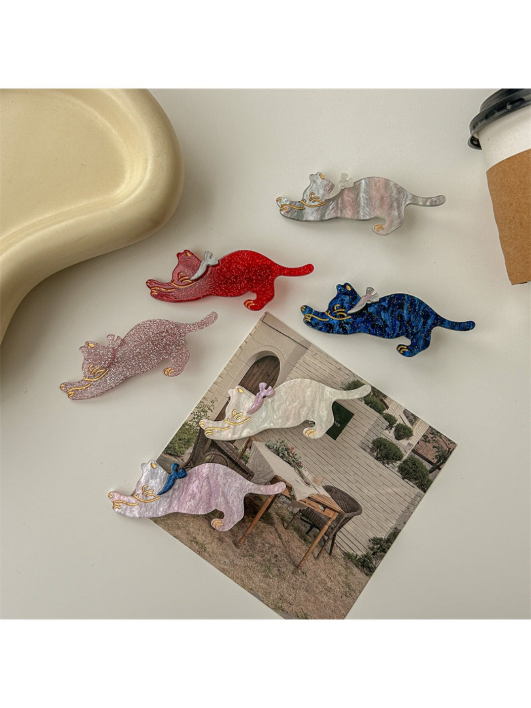 Close-up of Beau cat shaped hair clip showing detailed face design