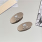 Beau - Oval Alloy Starfish Detail Side Hair Clip