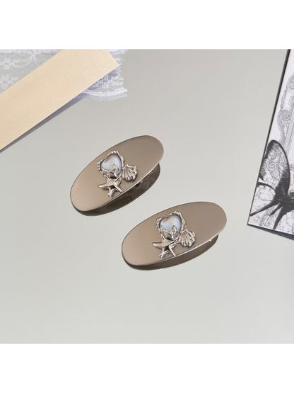 Beau - Oval Alloy Starfish Detail Side Hair Clip