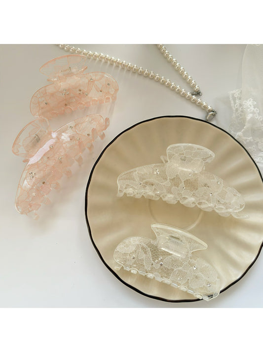 Beau sweet semi circular hair claw clip in beige on white background
