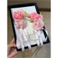 Beau Sweet Lifelike Flower Ribbon Hair Clip with pink and white fabric flowers