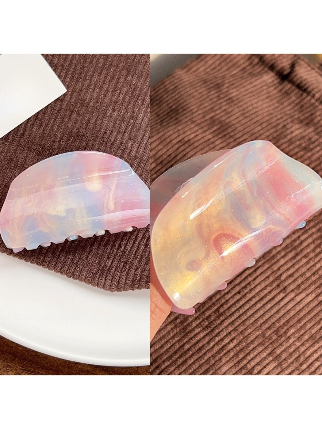 Beau colorful hair claw clip resting on fabric background