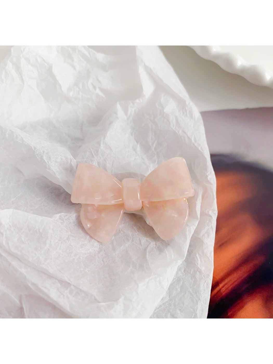 Back of Beau delicate bow hair clip showing the metal clip mechanism