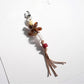 Side angle of Keypus acrylic beaded flower keychain highlighting bead colors
