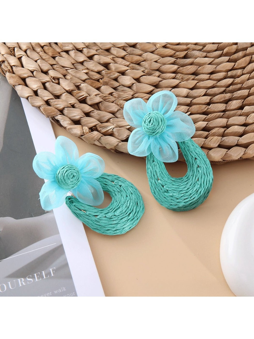 Sweet Raffia Flower Shaped Stud Earrings in a jewelry box with soft fabric lining