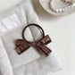 Gifty - Bow Shaped Hair Ties and Hair Clips
