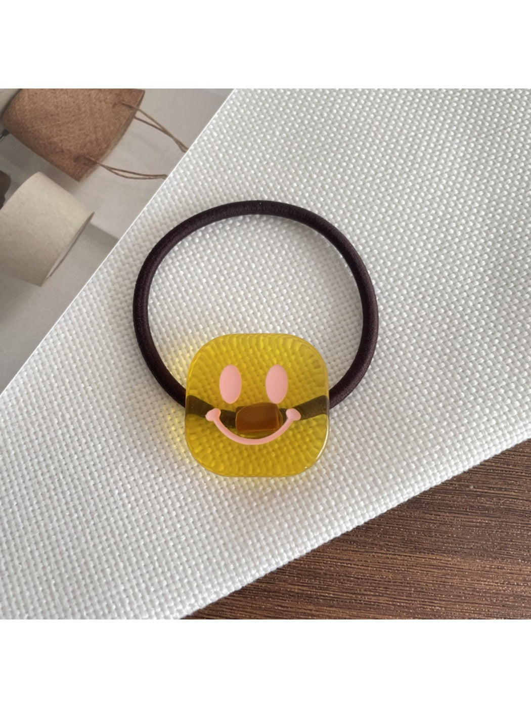 Gifty - Stylish Smiley Face Hair Tie