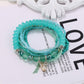 Lovra multi-row bracelet worn on wrist showcasing elegant beaded style