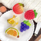 Beau brand cute fruit shaped hair claw clips in assorted colors on white background