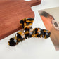 Beau hair claw clip securing medium-length wavy hair from the back