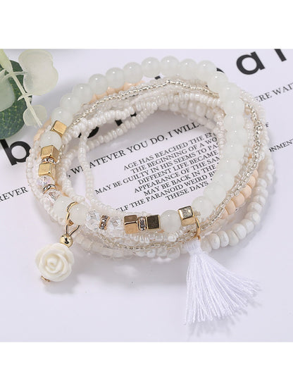 Lovra bracelet with flower pendant worn on wrist showing size and fit