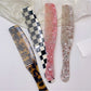 Camerow long handle hair comb held in hand demonstrating size and grip