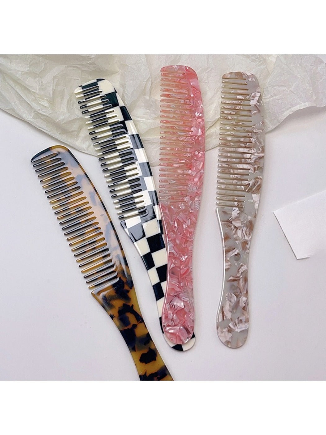 Camerow long handle hair comb held in hand demonstrating size and grip