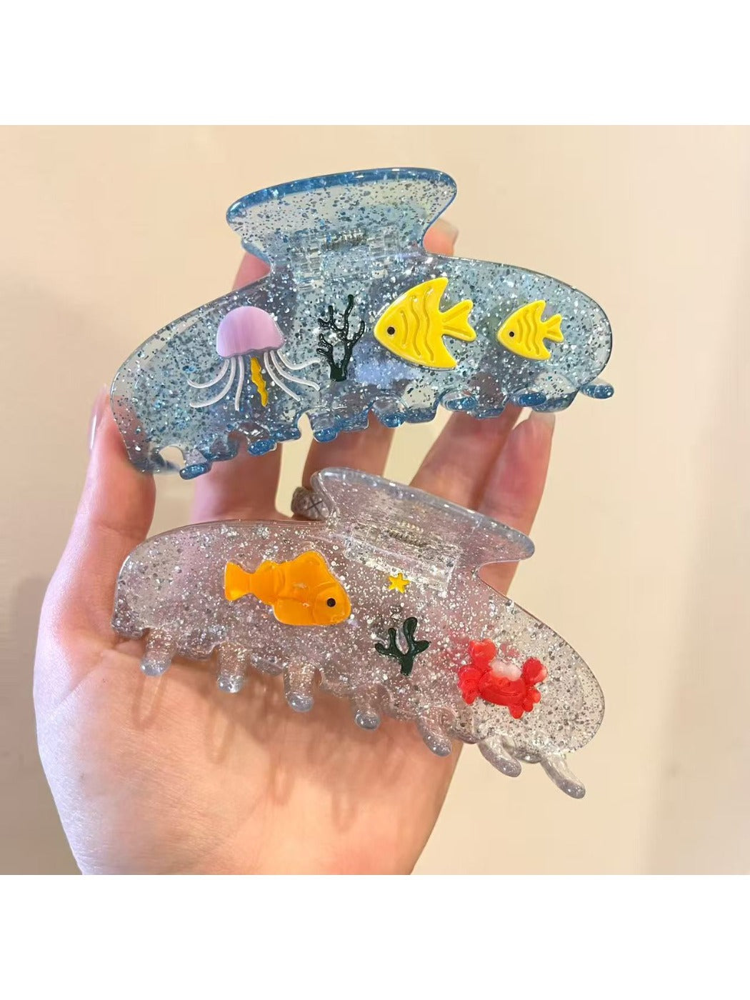 Side view of Beau fish decor claw clip highlighting the curved design