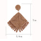 Model wearing Earedge geometric raffia square earrings with casual outfit