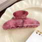 Top view of Beau trendy pink ombre hair claw clip showing smooth finish