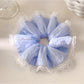 Close-up of Gifty elegant striped ruched scrunchie in soft fabric