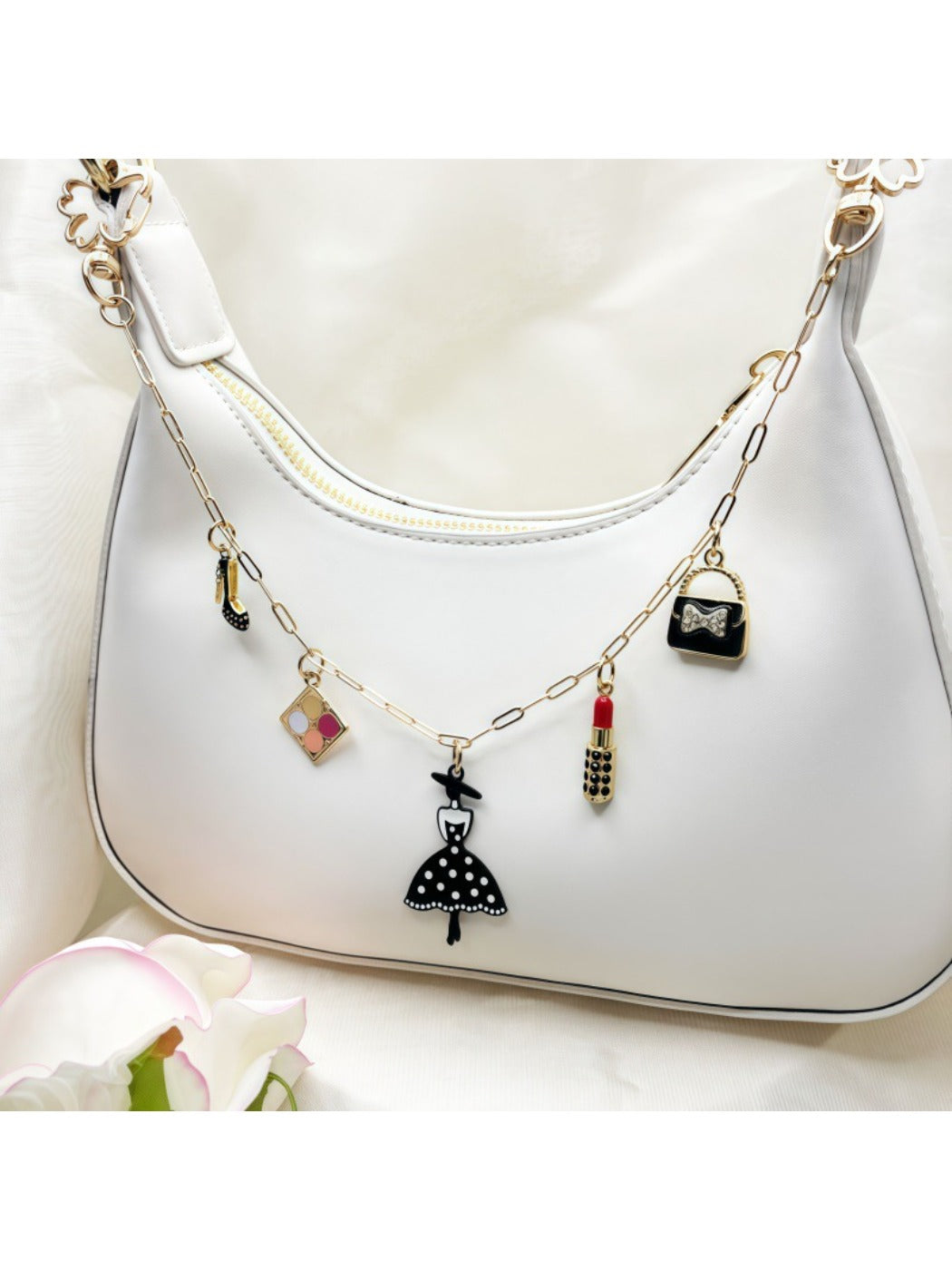 Keypus fashion pendant bag charm with gold-tone metal and decorative tassel