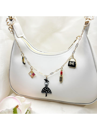 Keypus fashion pendant bag charm with gold-tone metal and decorative tassel