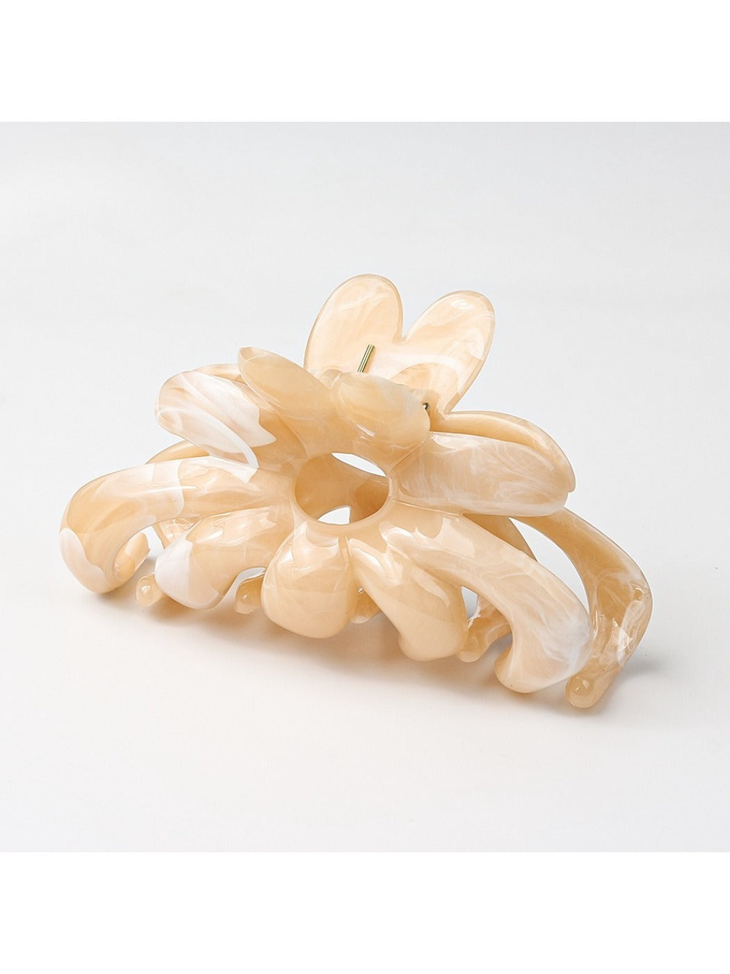 Model wearing Beau flower hair clip with loose waves